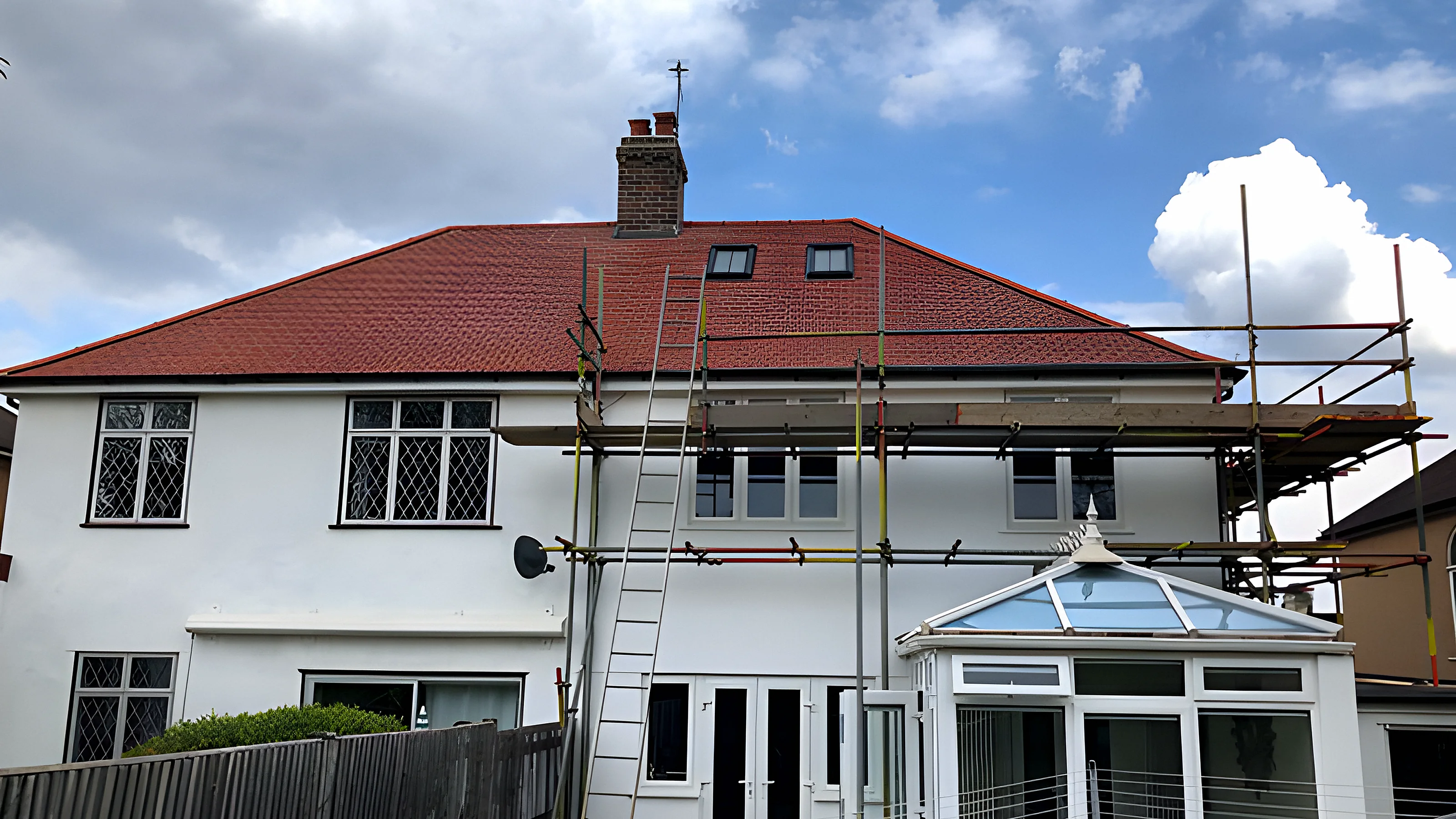 A 1930s semi detached house photographed from the road, the kind of picture that starts a job