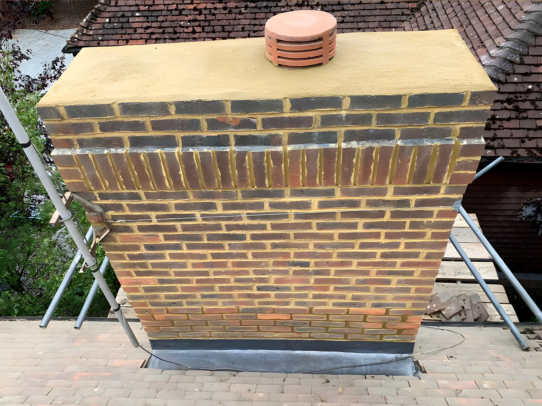 Rebuilt chimney stack with a new lead tray and clay pot fitted