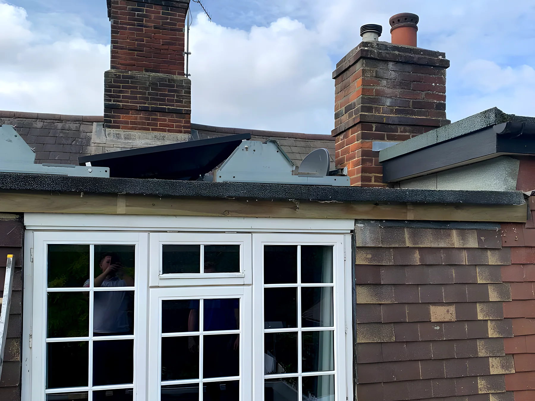 Dormer with new white fascias and soffits, a finished job