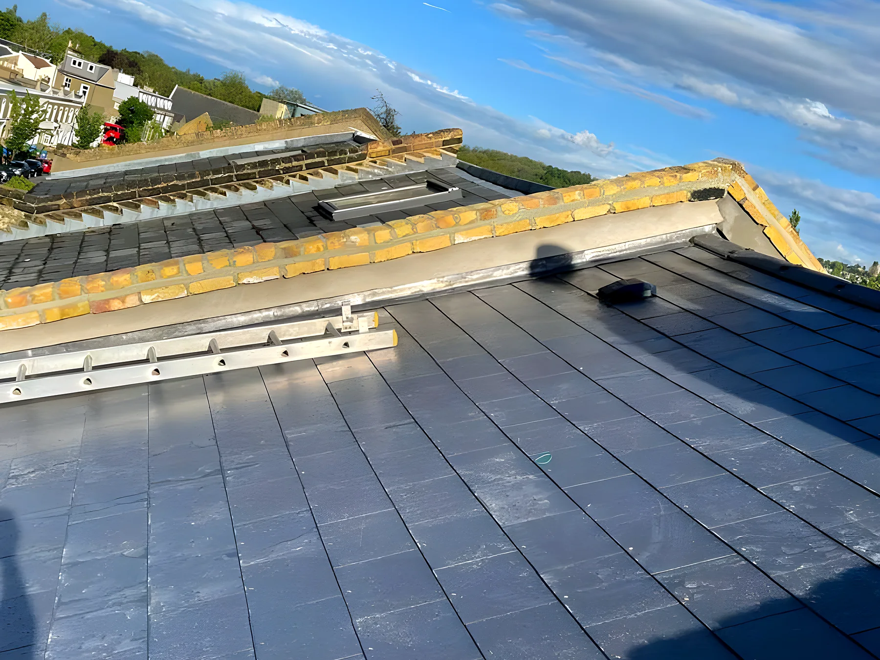 Natural slate roof with a new lead valley, the detail a ceiling stain usually traces back to